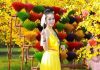 Hoa hậu Sắc đẹp Hoàn vũ Thanh Hằng diện yếm thắm hóa nàng Xuân rực rỡ